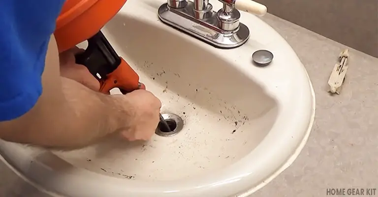 unclog bathroom sink with drain auger
